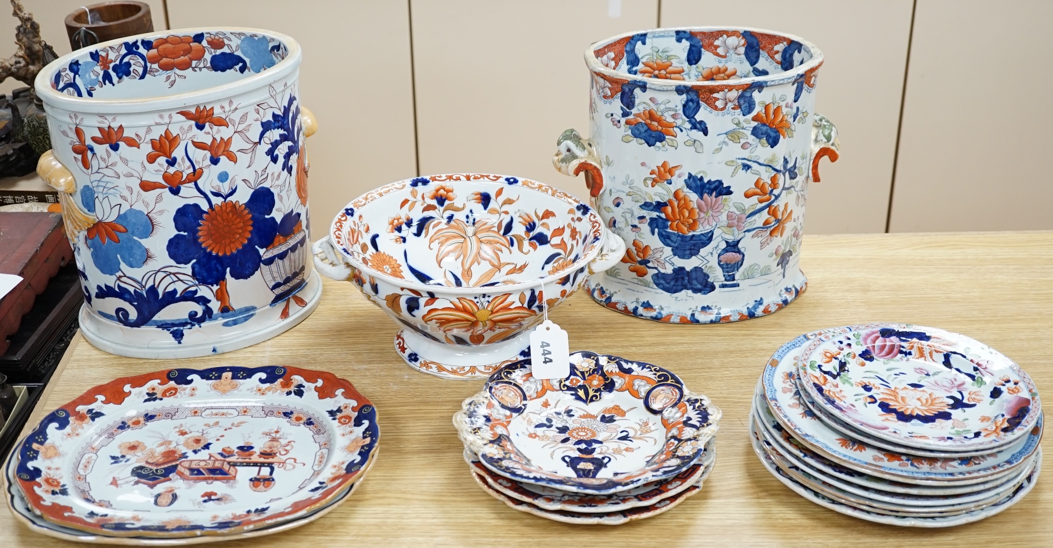 Seventeen ironstone items including two jardinières, a tureen and a quantity of plates, largest 28cm high. Condition - poor to fair